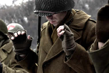 Soldiers praying, from Saints at War